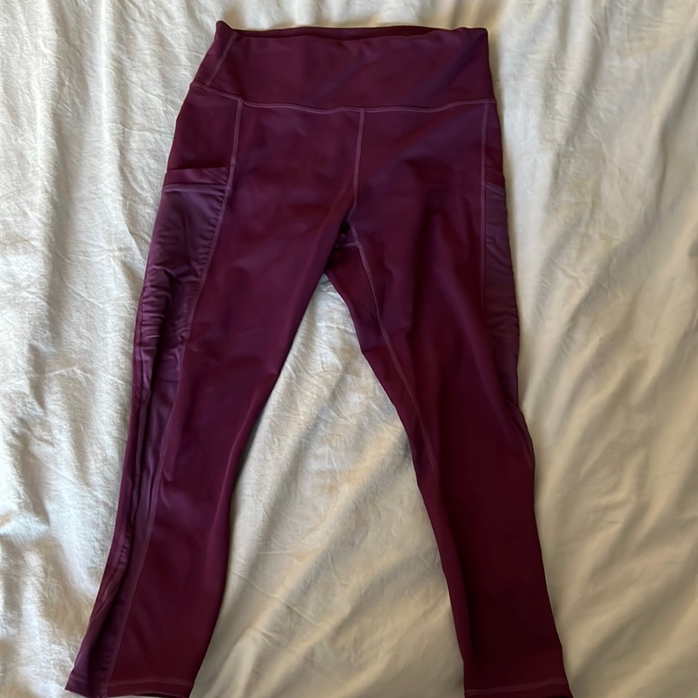 Maroon Fabletics powers leggings with mesh sides